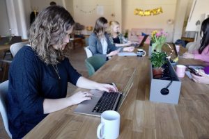 Employees using top AI connectivity software streamline communication across multiple tools and platforms